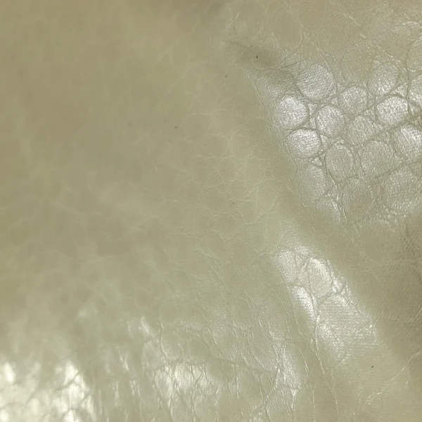 121798-1.webp PU PLEATHER MEDIUM WEIGHT BACKING OYSTER AND ANACONDA