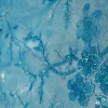 EMBROIDERED SCALLOPED TULLE WITH SEQUINS-FLORAL DESIGN TURQUOISE BLUE