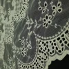 MESH WITH CORDED SCALLOPED BORDER CREAM